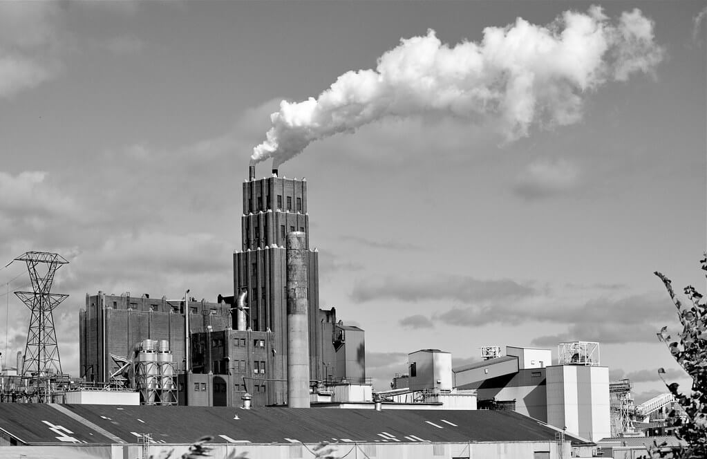 Factory with smoke pouring out